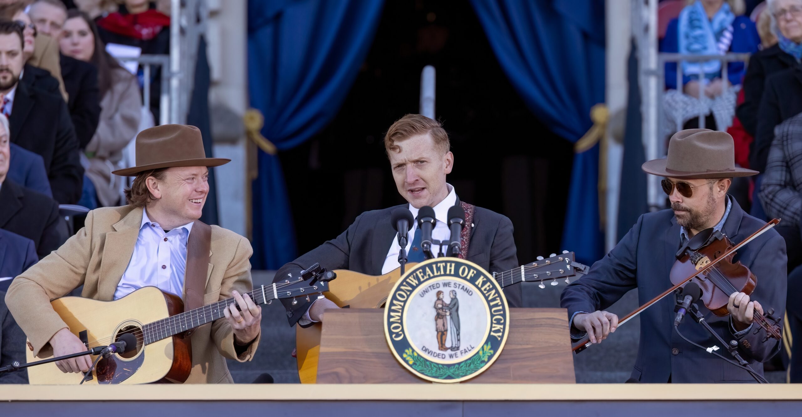 Image of Tyler Childers playing the guitar.